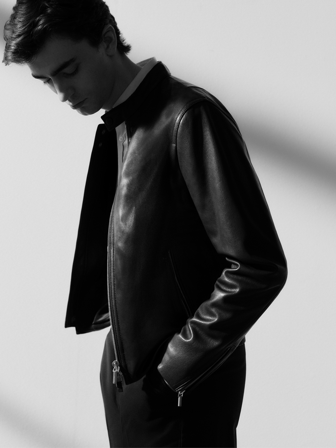 man in black leather jacket